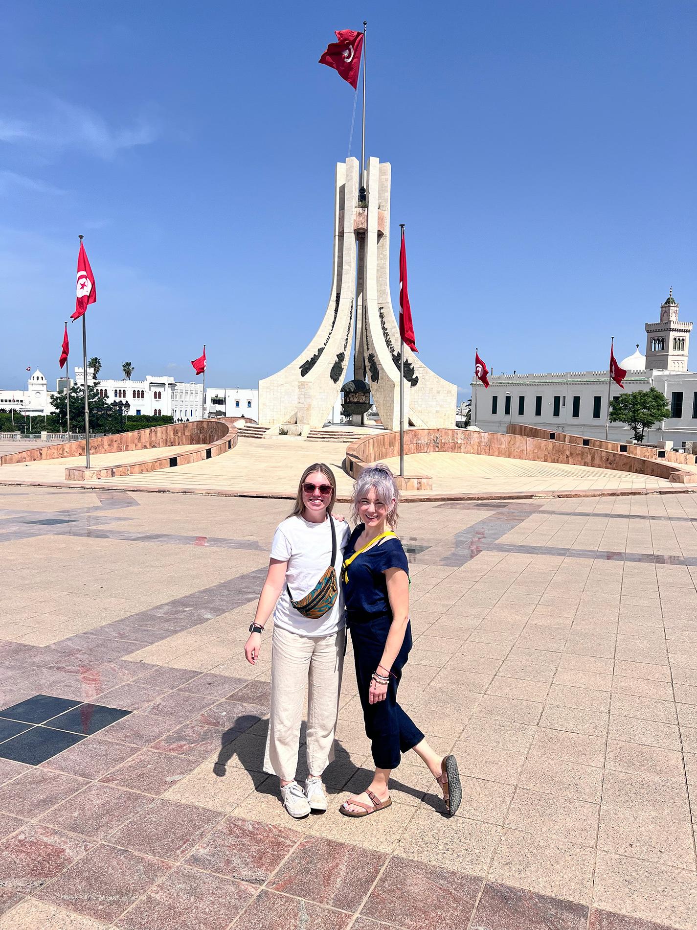 Photo of Riley Bond and Sarah Rose Larson in front of the National Monument of the Kasbah in Tunis, Tunisia